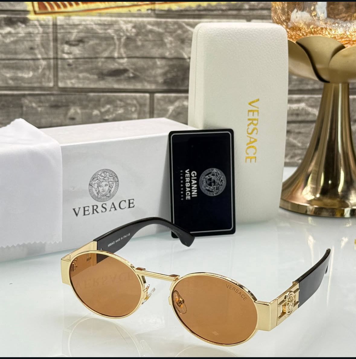 Luxury Oval Gold Frame Sunglasses – Amber Lens Edition